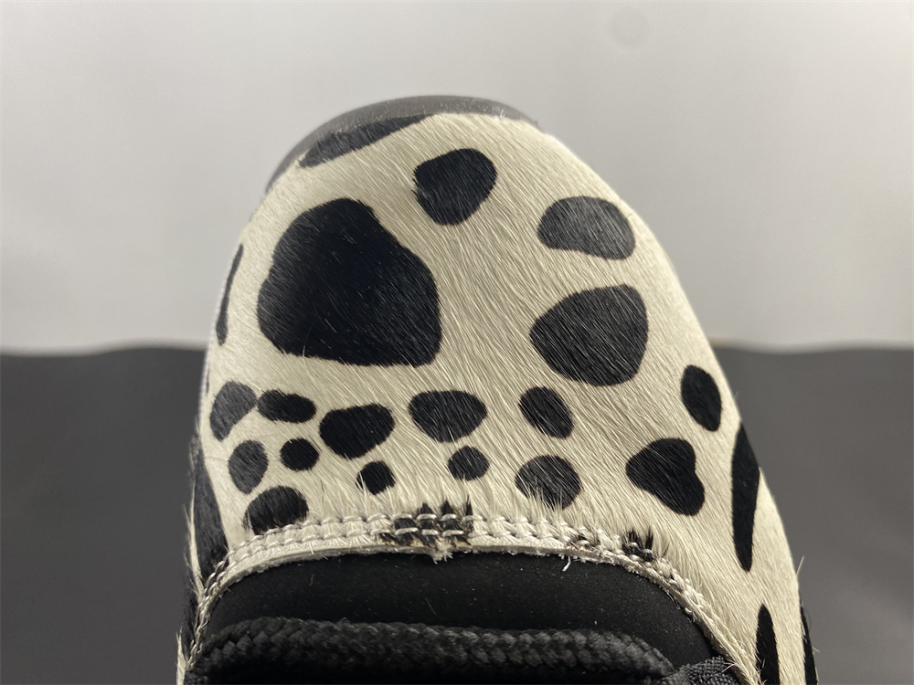 Air Jordan 11 “Animal Instinct” Black / Red / Sail / White