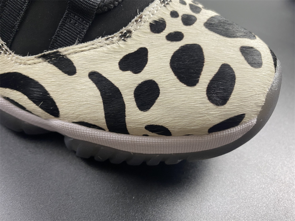 Air Jordan 11 “Animal Instinct” Black / Red / Sail / White